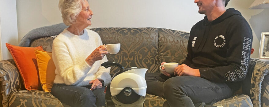 Grandmother and Grandson enjoying tea together with the Ucello Kettle