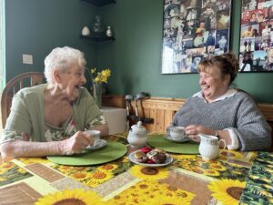 Mother and Daughter enjoy a cup of tea together