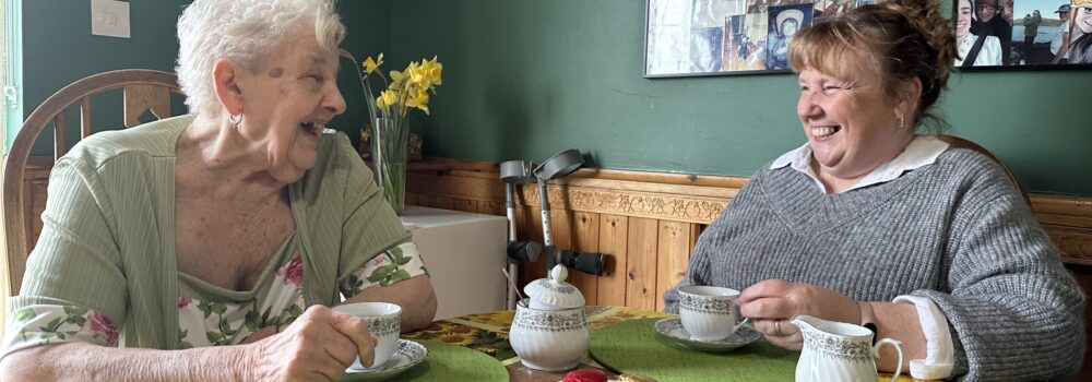 Mother and Daughter enjoy a cup of tea together