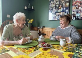 Mother and Daughter enjoy a cup of tea together