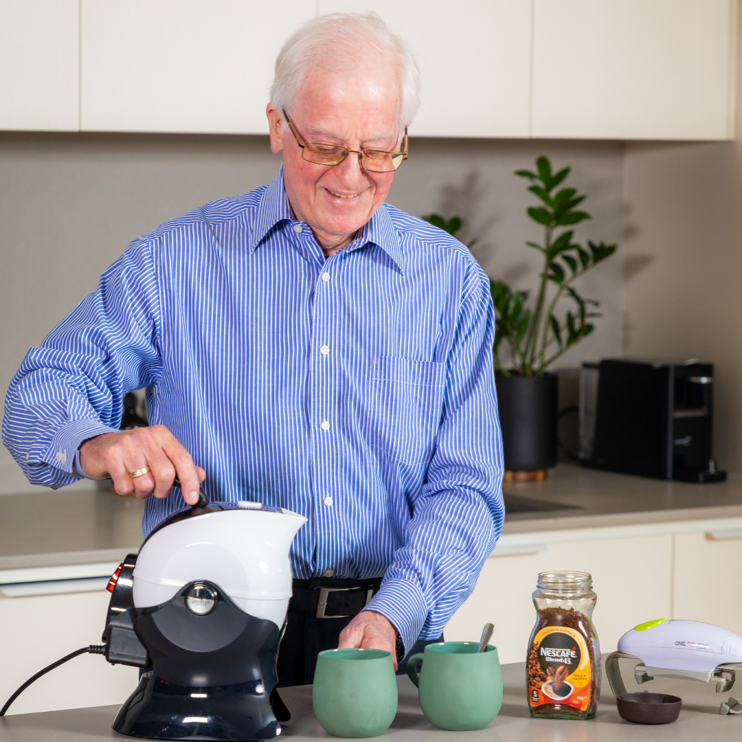 Elderly man making coffee with the Uccello Kettle