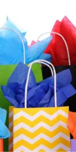 Lots of gift bags with colour tissue paper