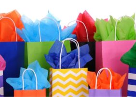 Lots of gift bags with colour tissue paper