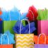 Lots of gift bags with colour tissue paper