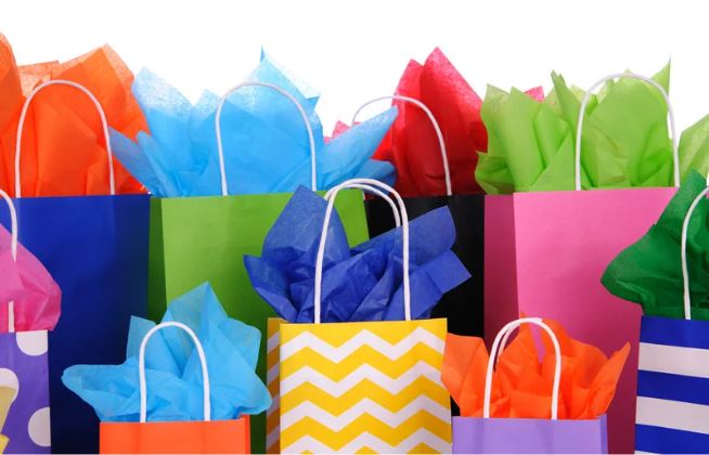 Lots of gift bags with colour tissue paper