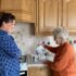 Mother and daughter in the kitchen making tea with their Uccello Kettle