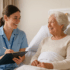 Occupational Therapist talking with customer in Hospital